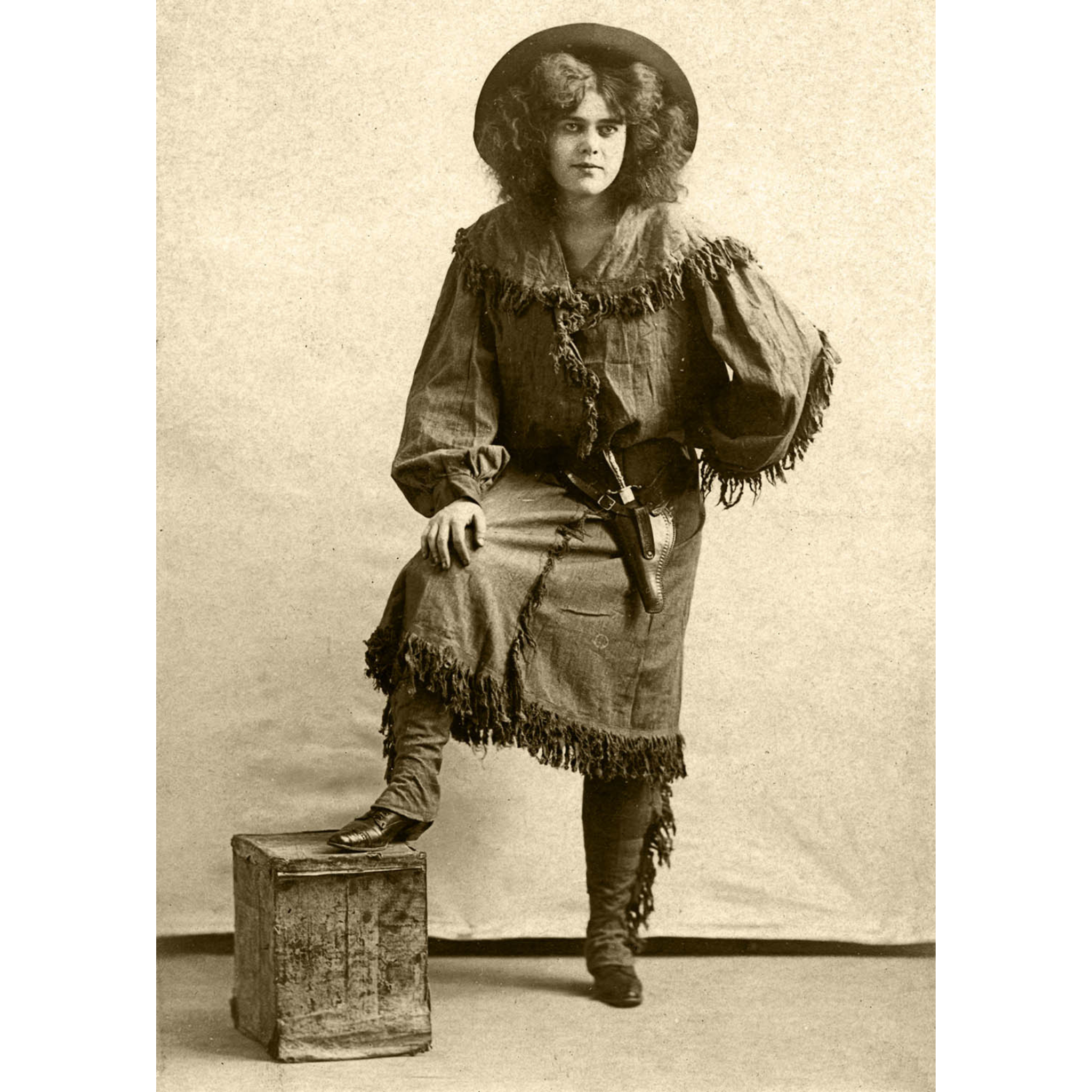 Cowgirl foot on Stool Knife in Holster - ca. 1915 Photograph